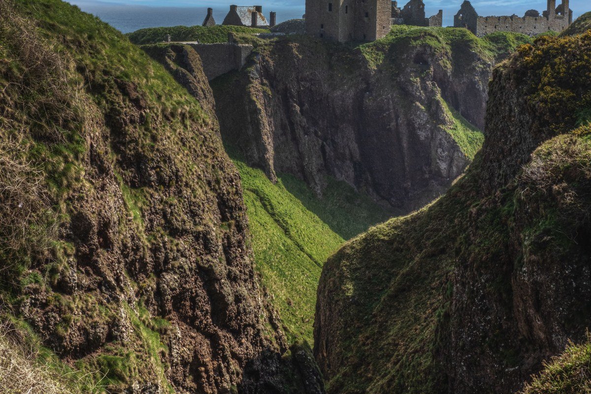 Dunnottar Castle cliff edge Aberdeenshire Scotland dramatic stormy sky