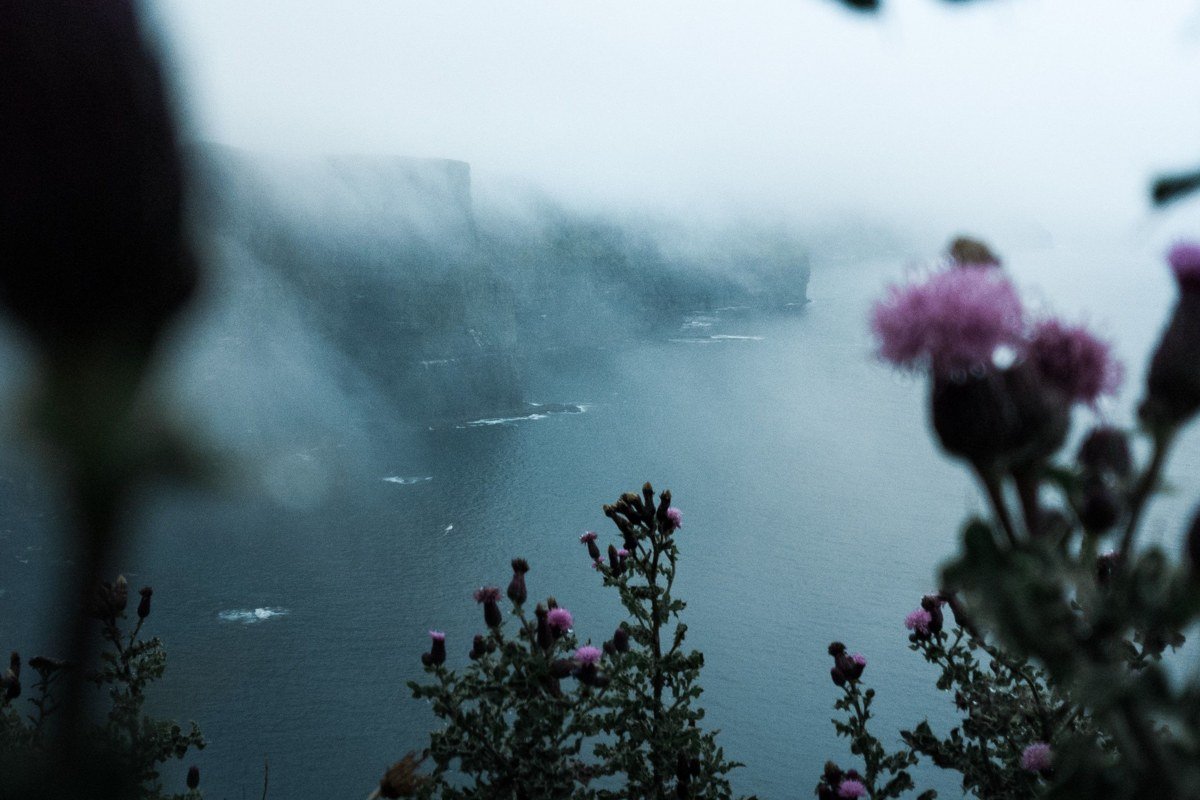 Ross of Mull Scotland pink granite coastline sea mist Atlantic ocean moody sky