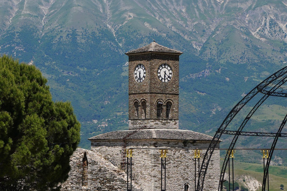 Gjirokaster Albania Ottoman stone houses hillside castle view misty morning