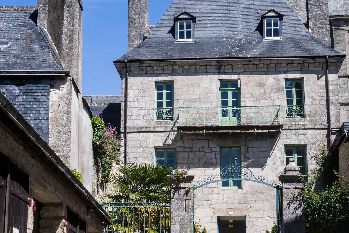 Rochefort-en-Terre Brittany France flower-covered medieval village stone houses summer