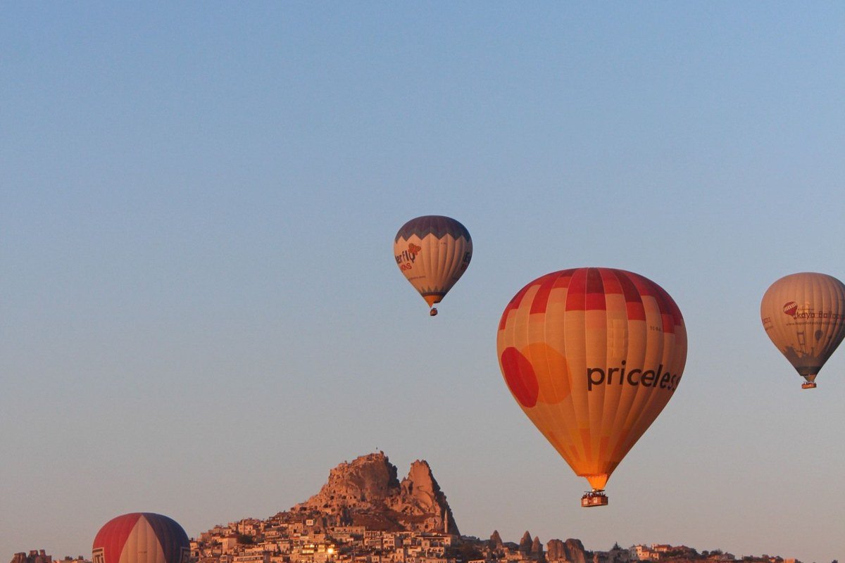 Cappadocia Turkey fairy chimneys hot air balloons sunrise pink sky
