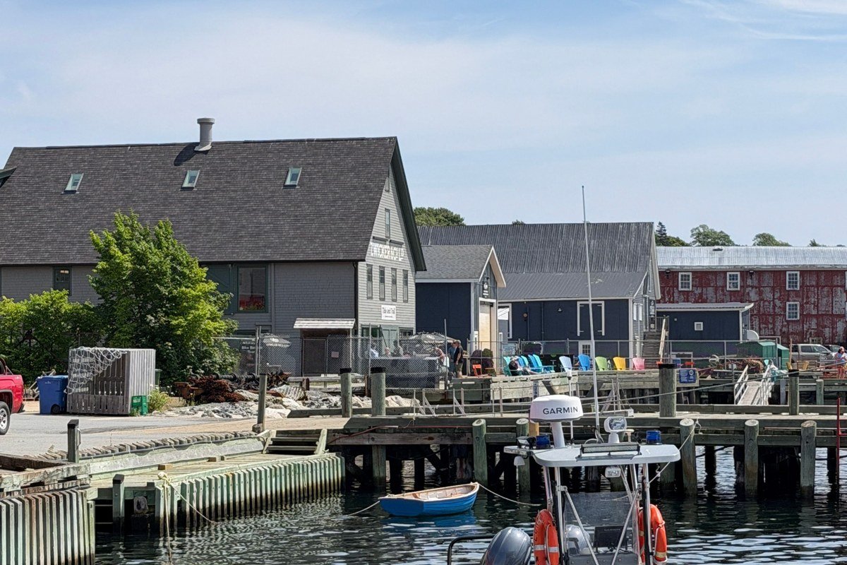 Lake Sunapee New Hampshire harbor village waterfront boats summer blue sky