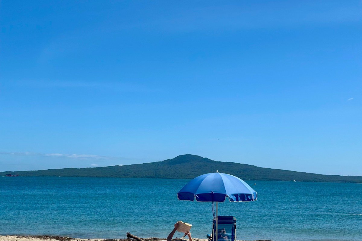 Newfound Lake New Hampshire crystal clear water sandy beach summer afternoon