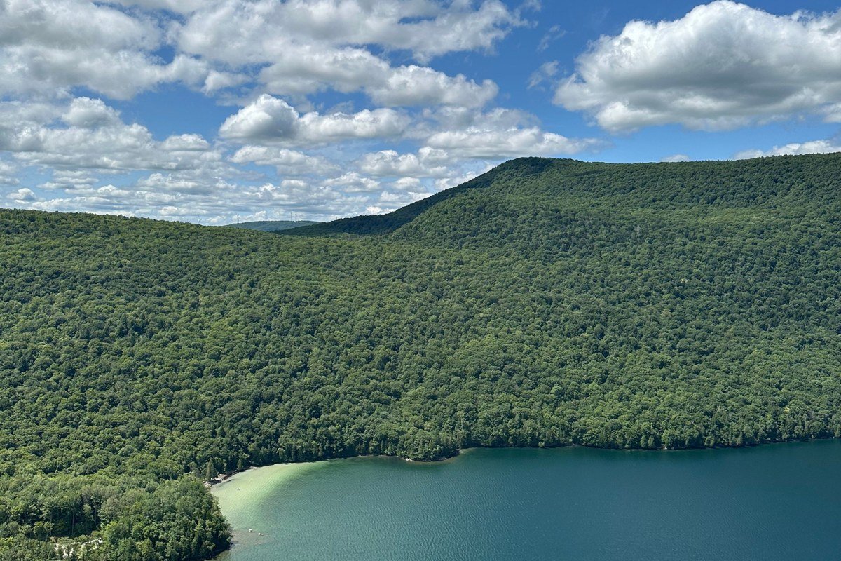 Lake Willoughby Vermont dramatic cliff face summer blue water fiord