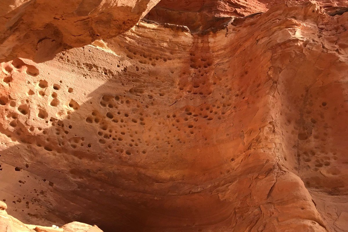 Cueva de las Manos Argentina ancient cave paintings red ochre hands canyon