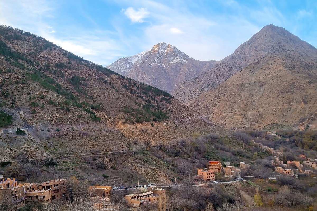 Imlil village Morocco winter clouds Toubkal mountain snow Berber stone houses