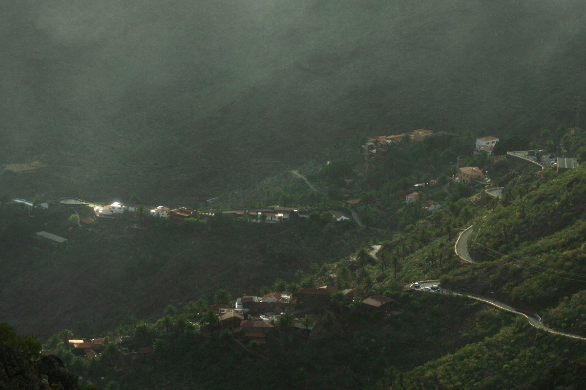 Aït Bou Guemez valley Morocco terraced fields fog Berber village green valley High Atlas