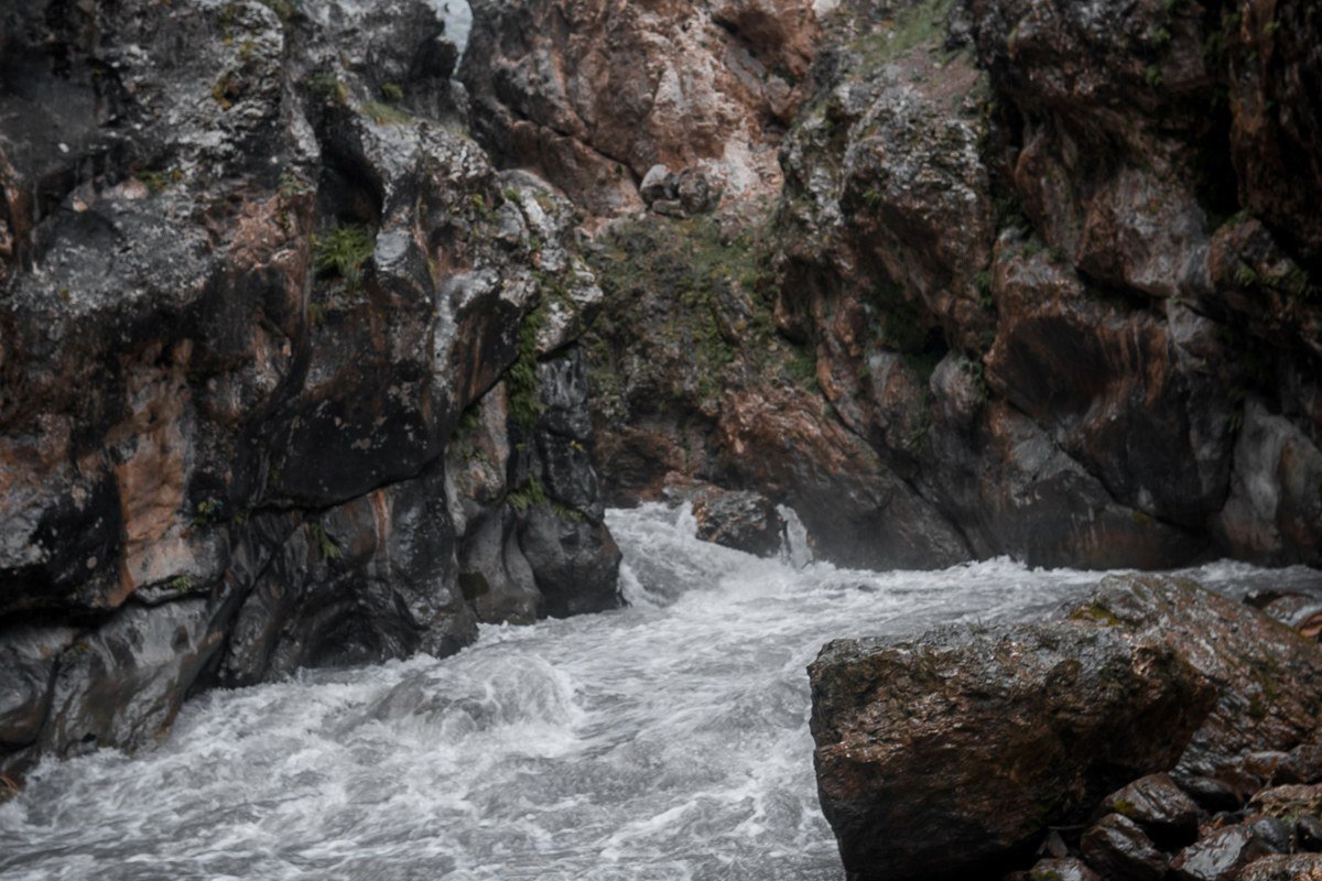 Todra Gorge Morocco winter rain mist towering red rock canyon ethereal light