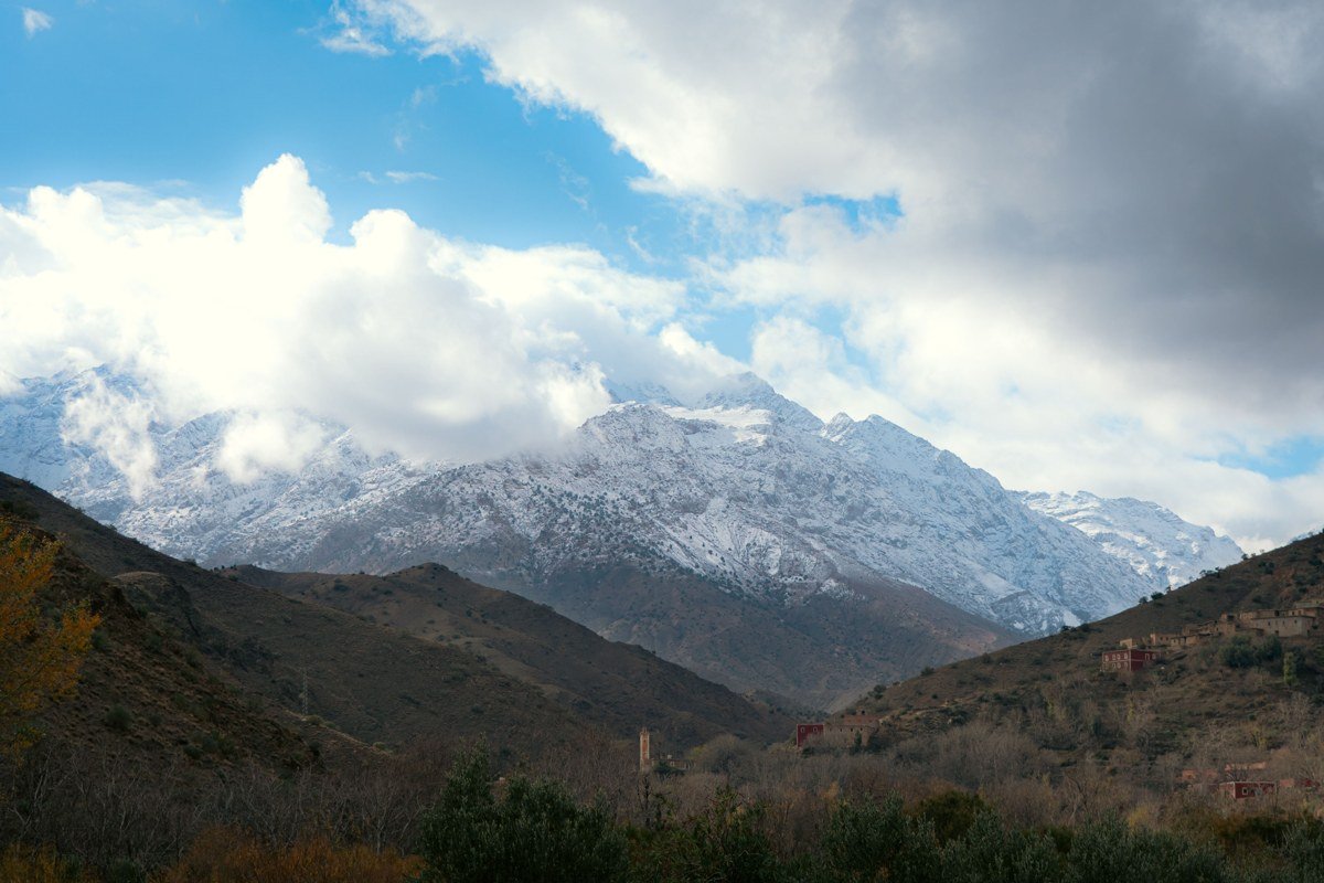 Midelt Morocco high plateau sunrise mist cedar forest Jbel Ayachi snow Atlas mountains
