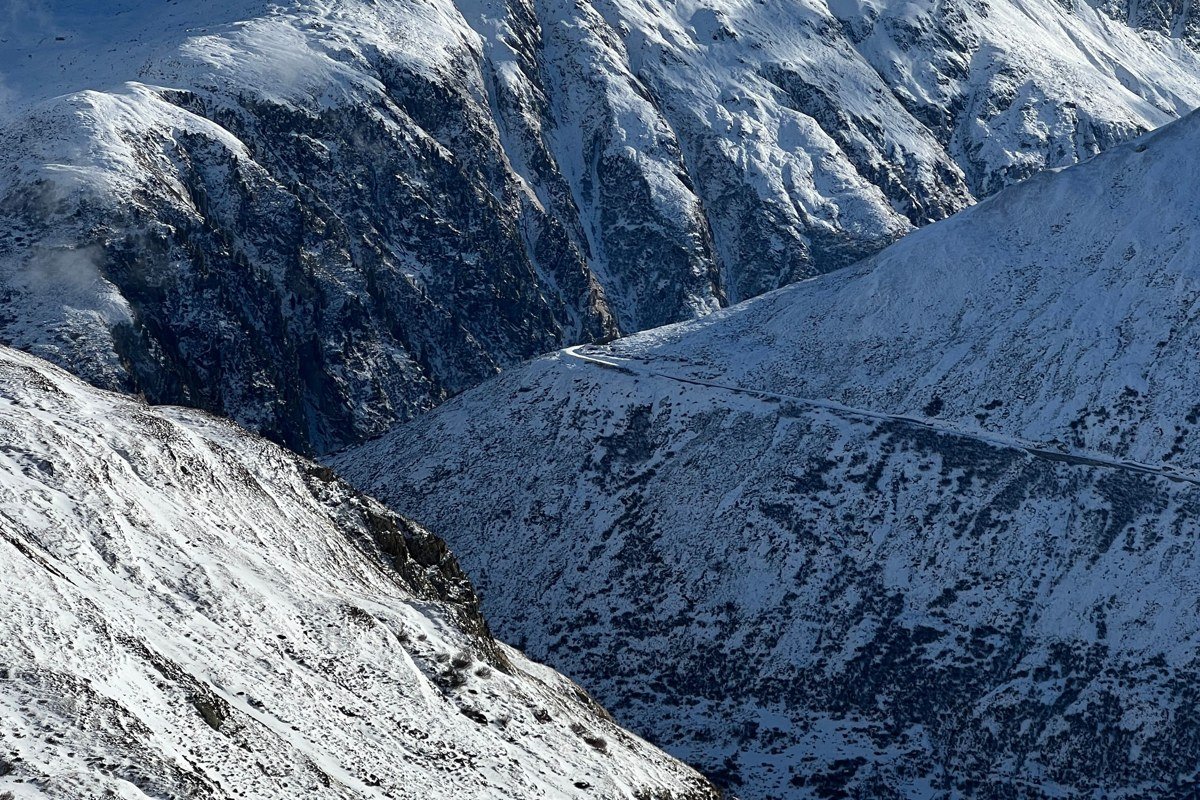 Tizi n'Test pass Morocco cloud road switchbacks Atlas Mountains dramatic alpine landscape