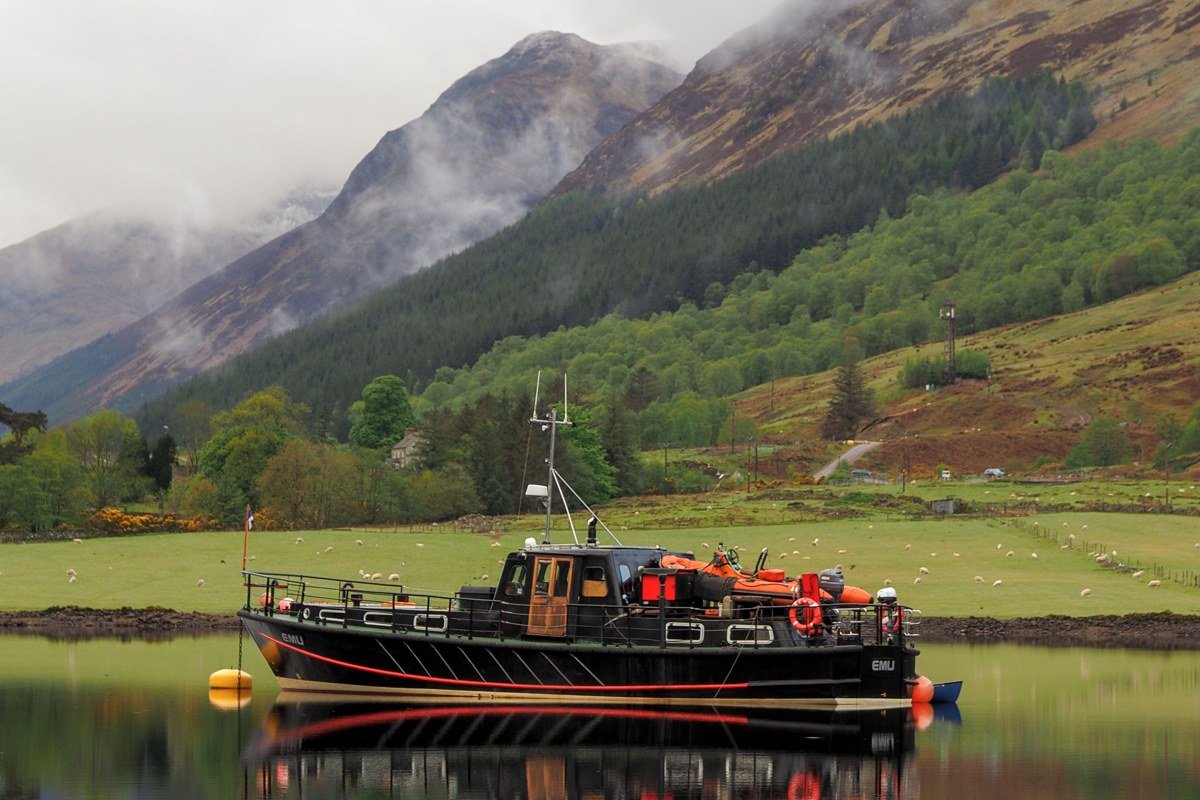 Loch Katrine Trossachs Scotland Victorian steamship Ben Venue reflection autumn forest