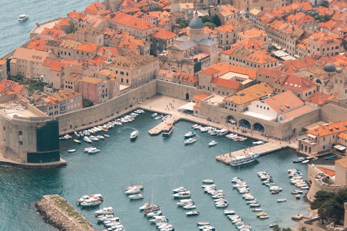 Hvar Town Croatia harbor lavender fields fortress hilltop golden hour