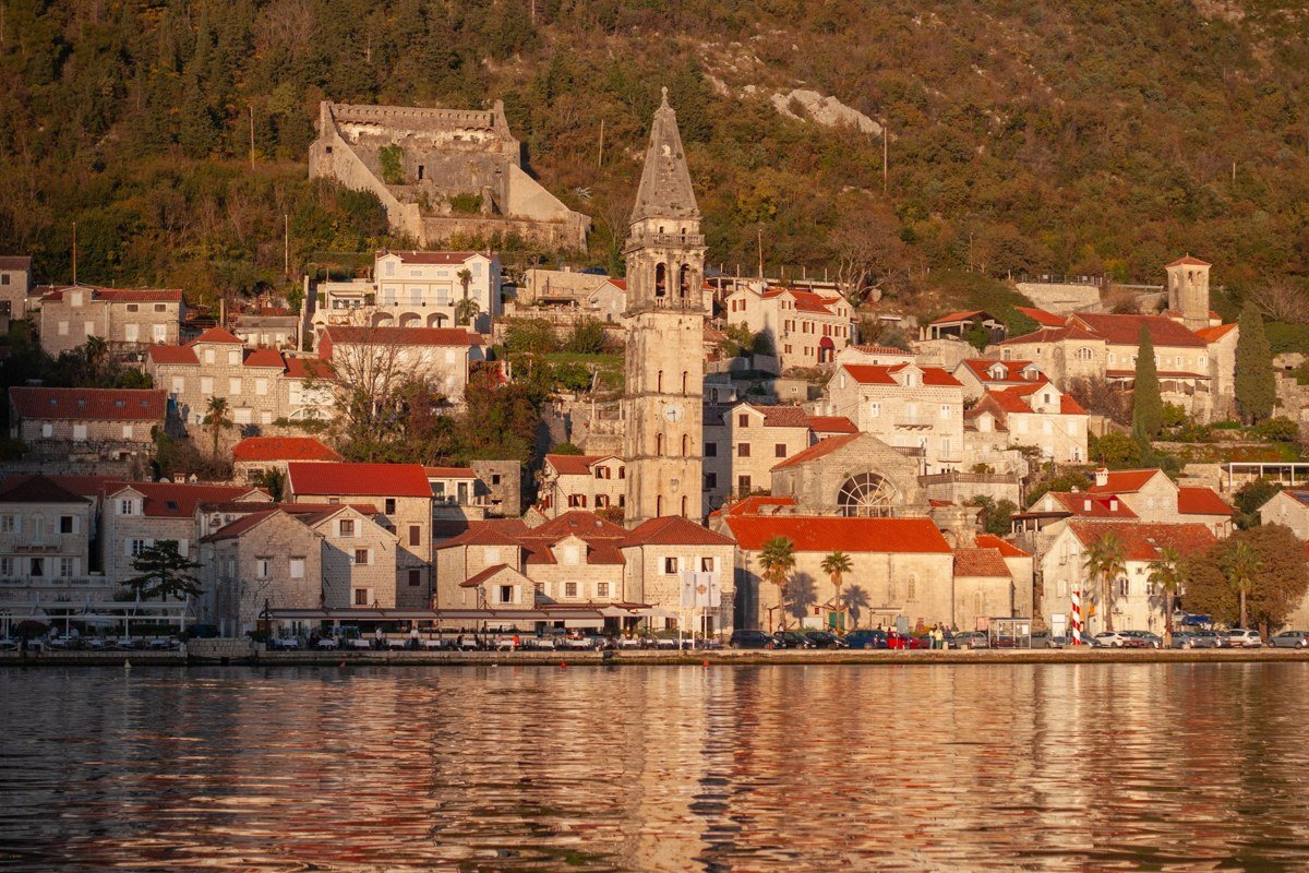 Kotor Montenegro Bay of Kotor walled old town mountains reflection water