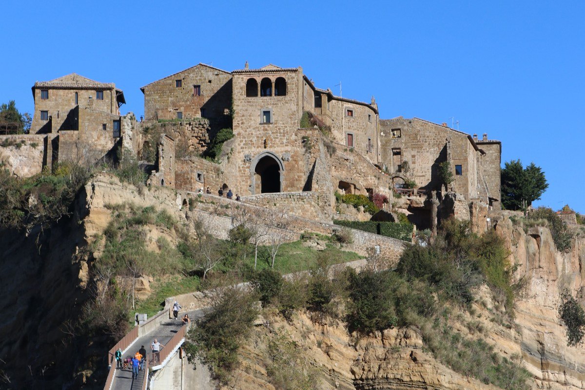 Civita di Bagnoregio Italy hilltop dying city tuff cliff mist valley