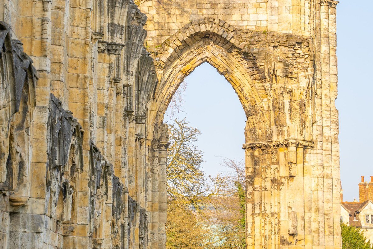 Melrose Abbey Scotland misty morning pink sandstone ruins gothic arches