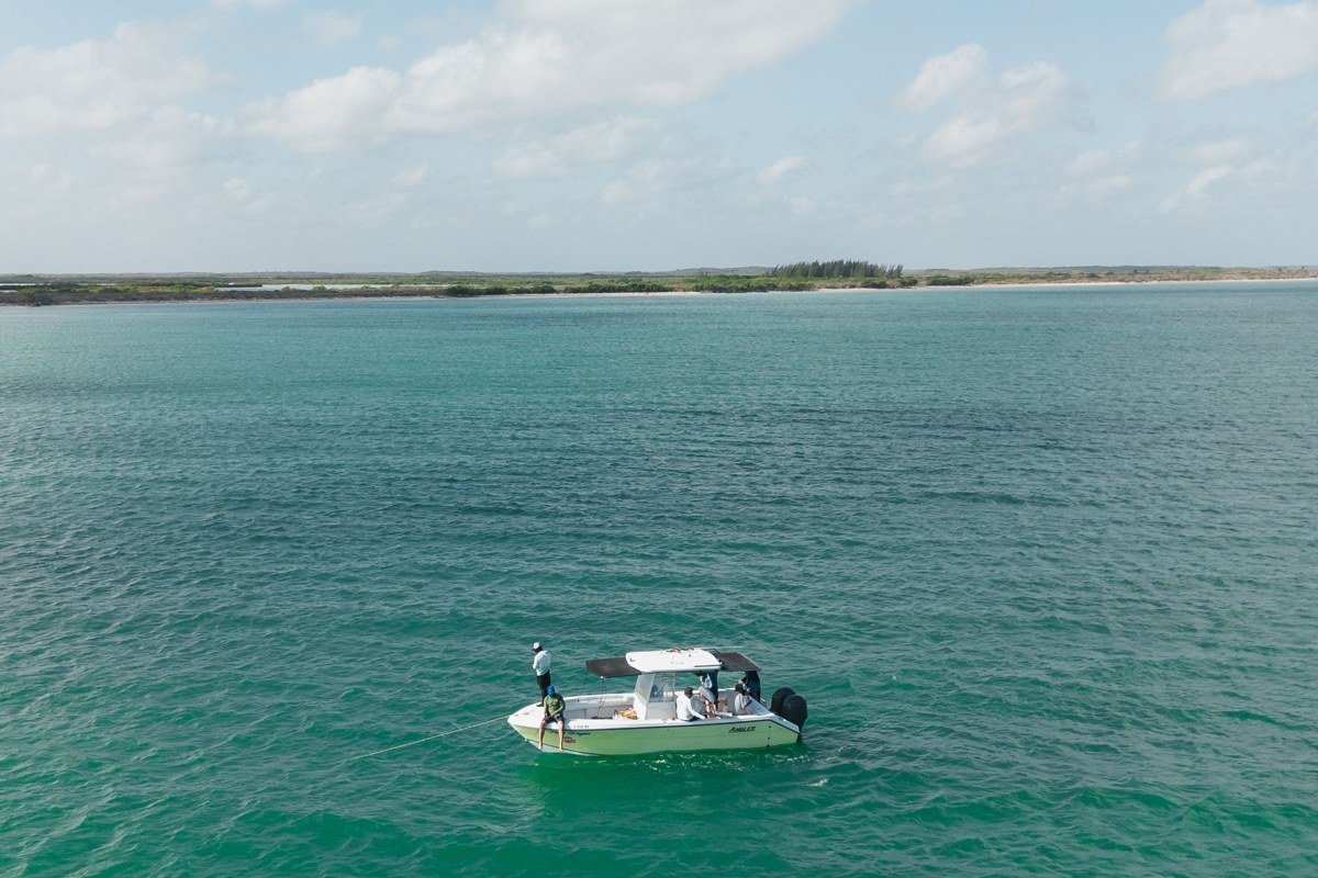 Quirimbas Archipelago Mozambique dhow sailing turquoise water mangrove island aerial