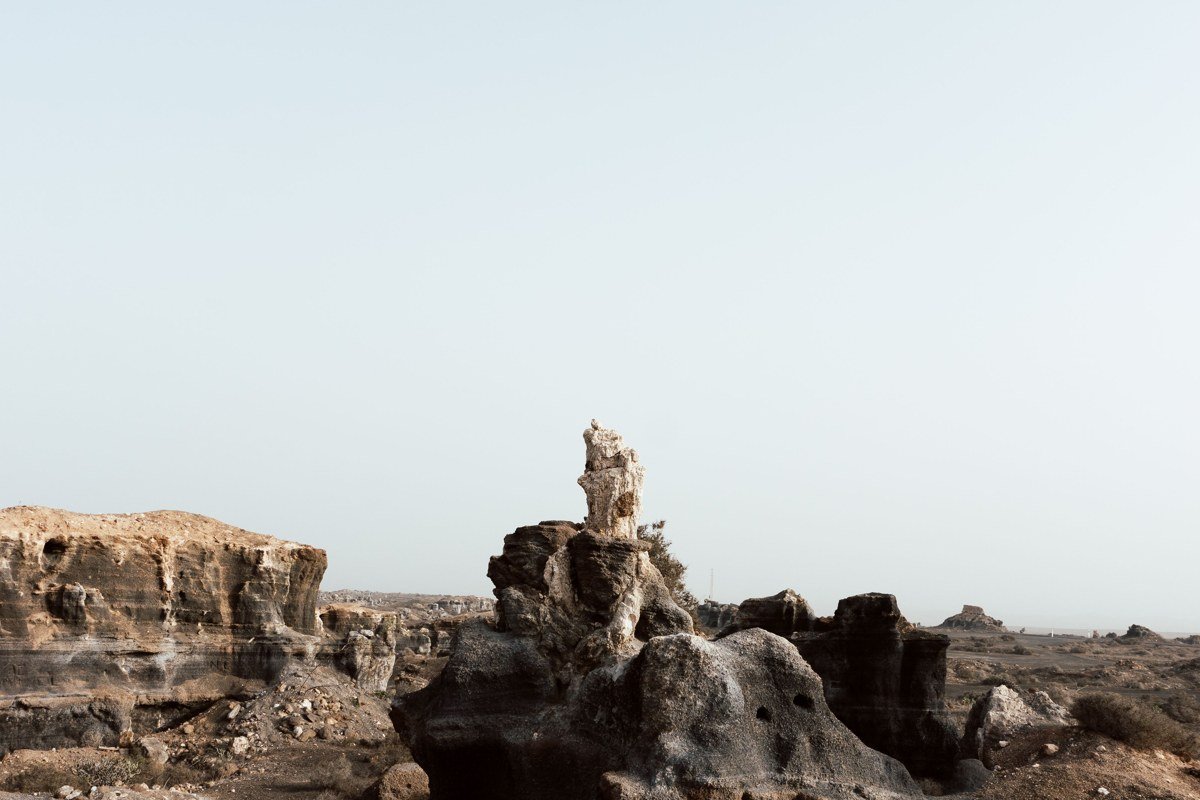 Valle de las Rocas Bolivia basalt volcanic rock formations Siloli Desert early morning amber light wide angle altiplano