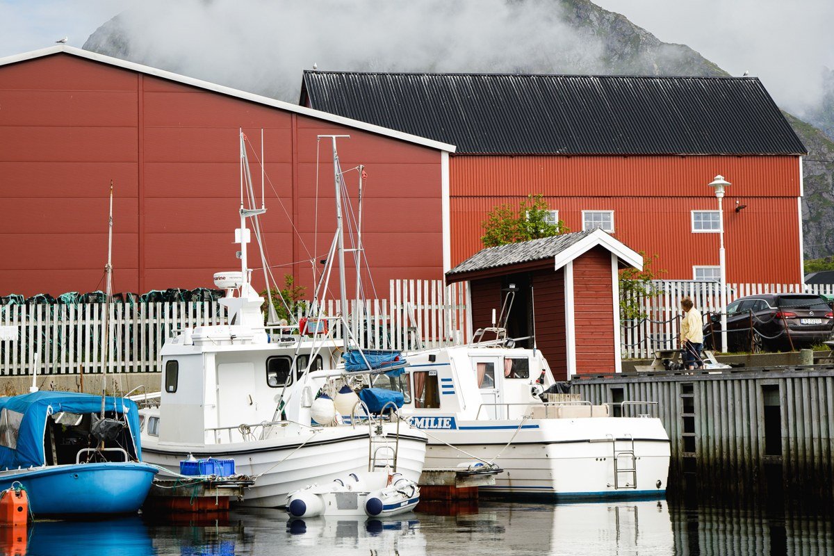 Djupivogur Iceland harbor village evening light mountains fjord small boats