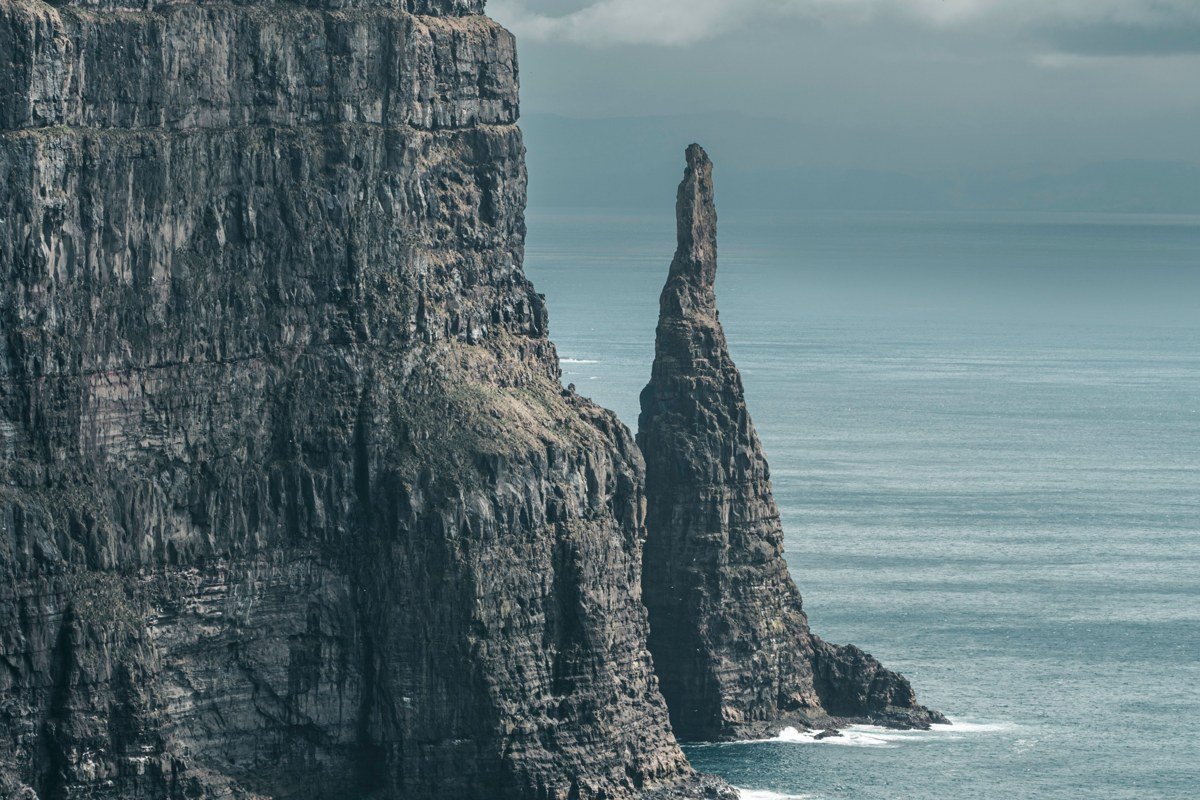 Risin og Kellingin sea stacks Eysturoy Faroe Islands sunrise silhouette ocean