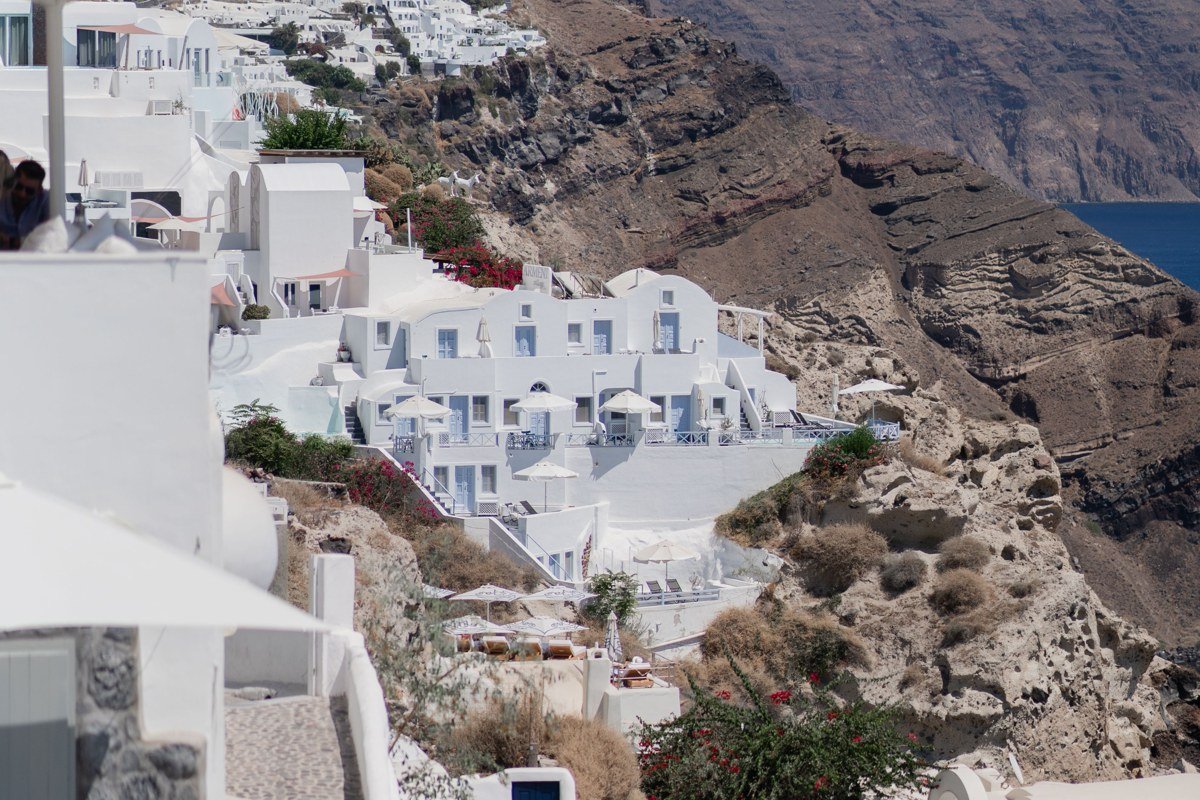 Thirasia island Greece caldera view Santorini volcanic cliffs traditional village whitewashed path donkeys