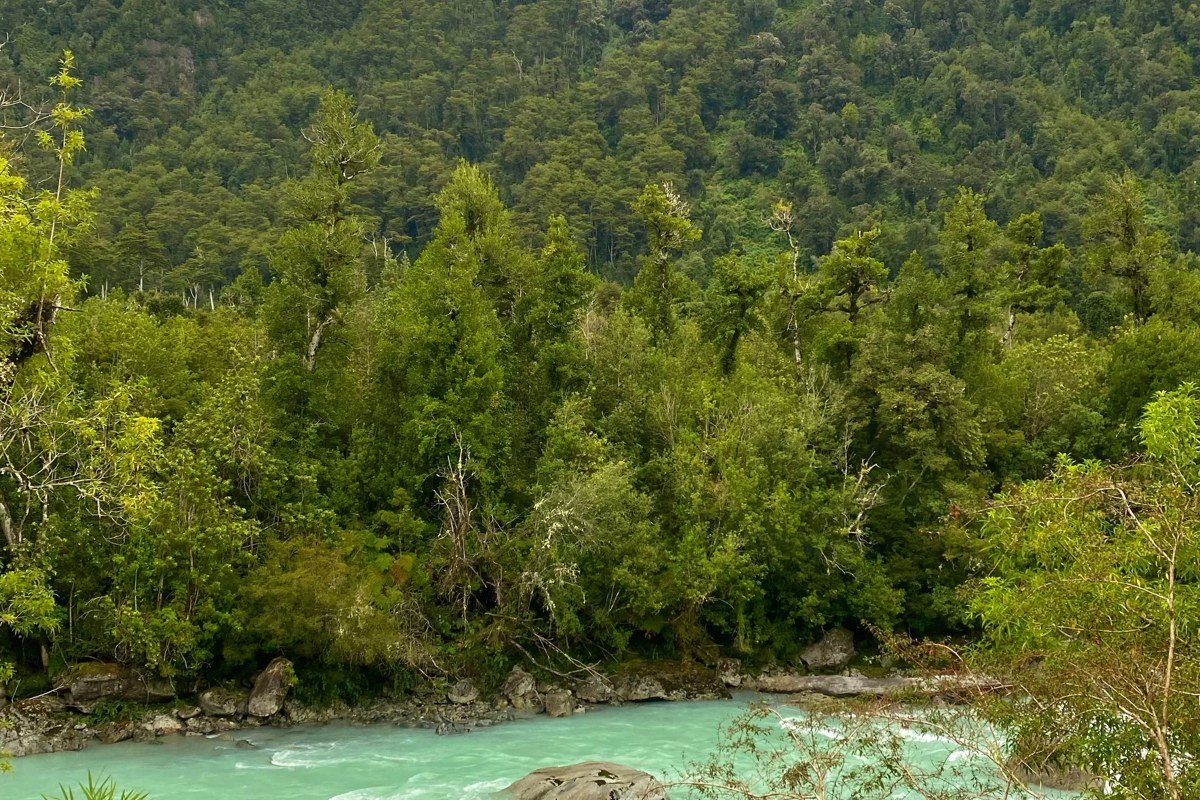 Patagonia river rafting turquoise glacial water dramatic mountain canyon panoramic