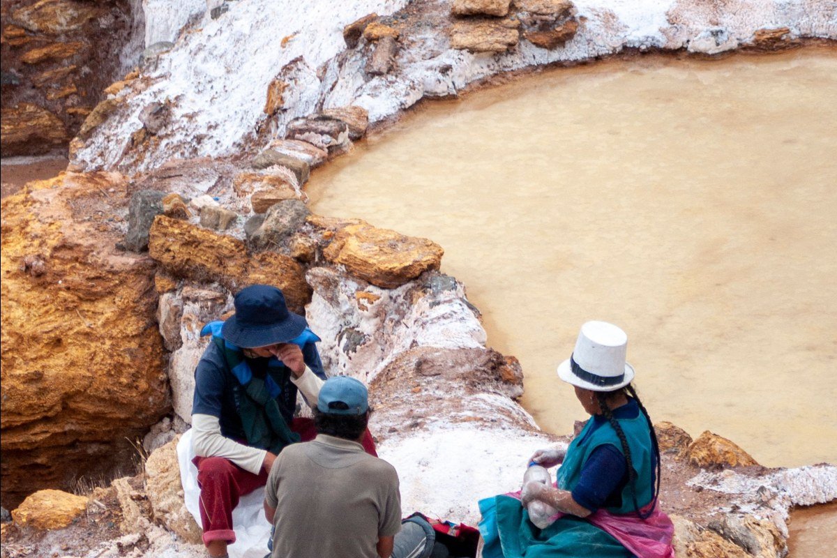 Colchani Bolivia salt flat village salt mounds workers harvesting dry season