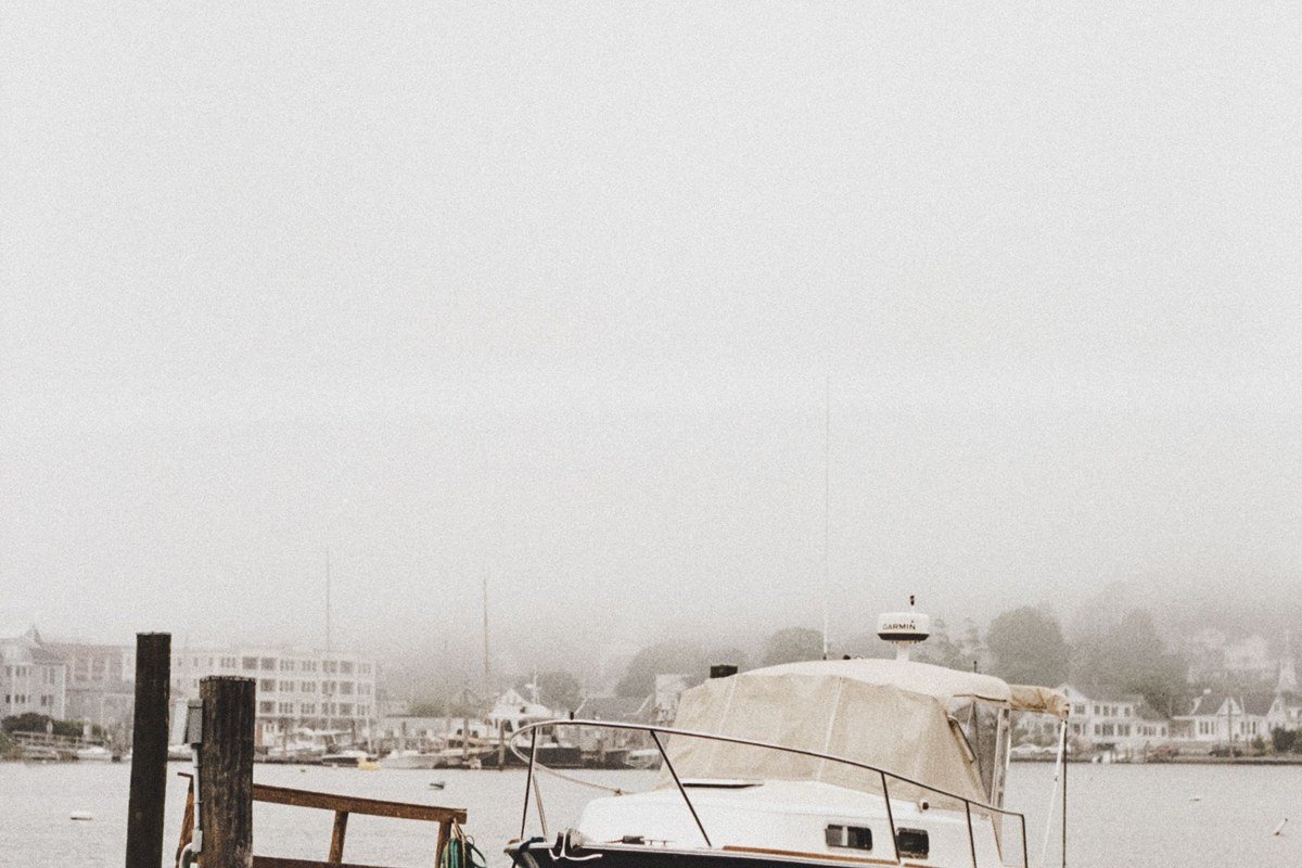 Stonington Maine working harbor lobster boats rocky coastline foggy morning