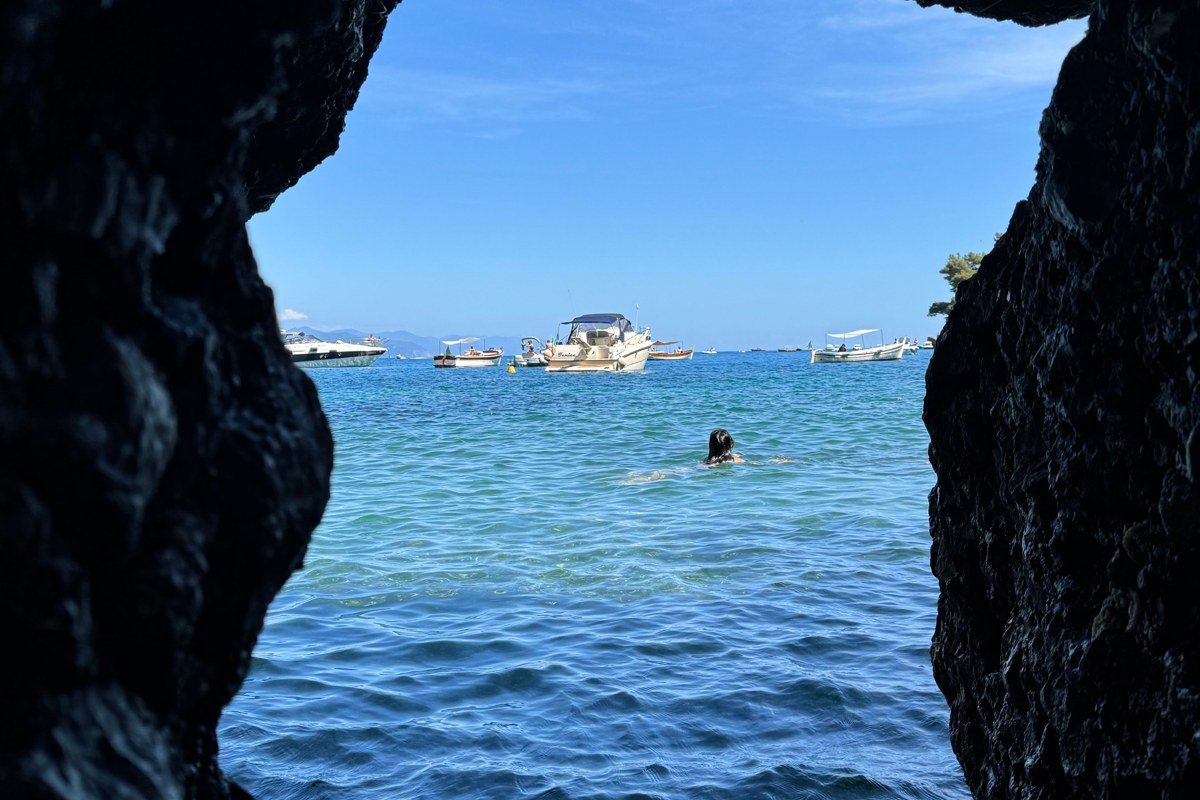 Togian Islands Sulawesi Indonesia coral wall cave dive turquoise water boat