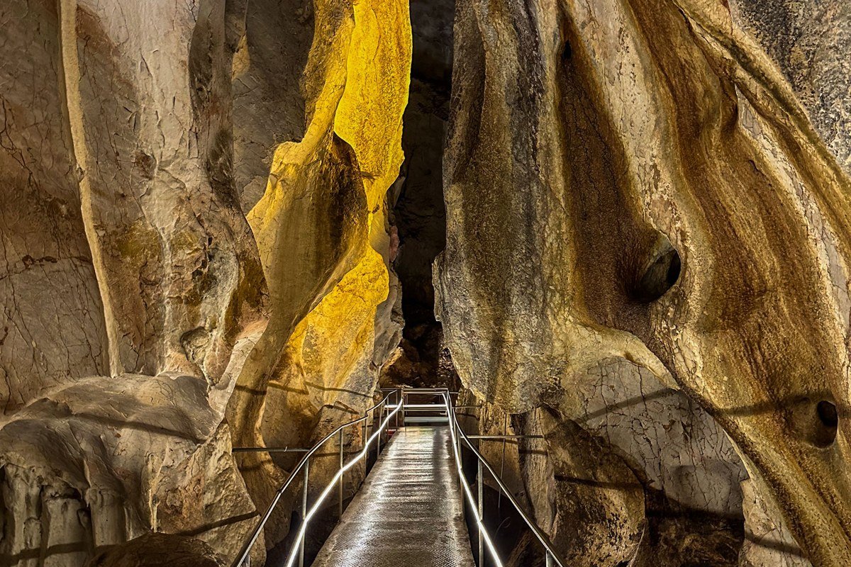 Phong Nha Vietnam jungle cave expedition headlamp river passage limestone formations