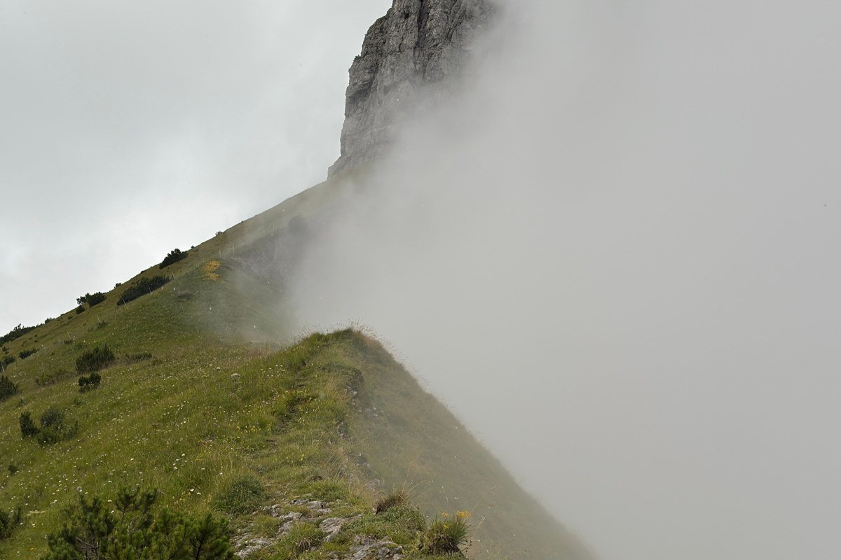Slættaratindur Faroe Islands highest peak foggy summit rocky ridge wide landscape
