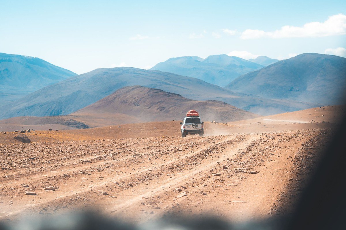 Laguna Colorada Bolivia red lake flamingos white borax islands altiplano