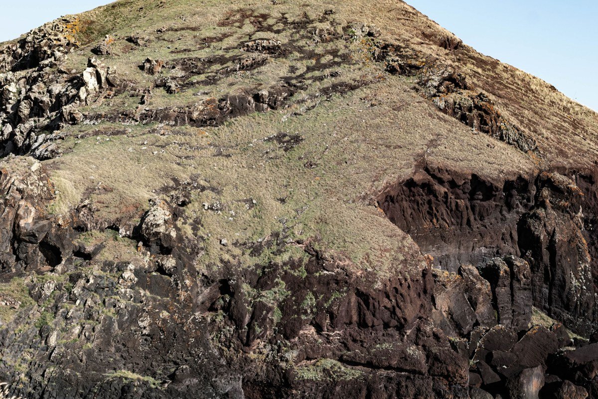 Sao Jorge island Azores faja coastal ledge cliffs mist Atlantic green pastures