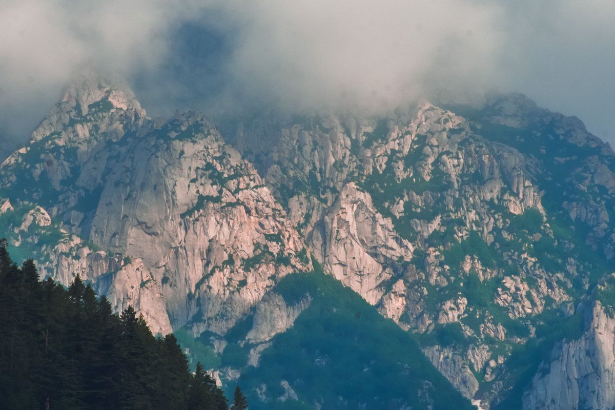 Ceahlau Massif Romania rocky summit plateau clouds dramatic light