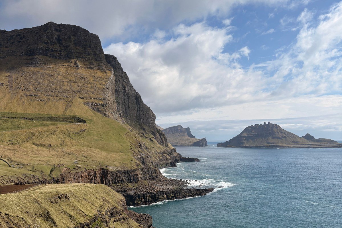 Vestmanna sea cliffs Faroe Islands boat tour nesting seabirds dramatic basalt columns