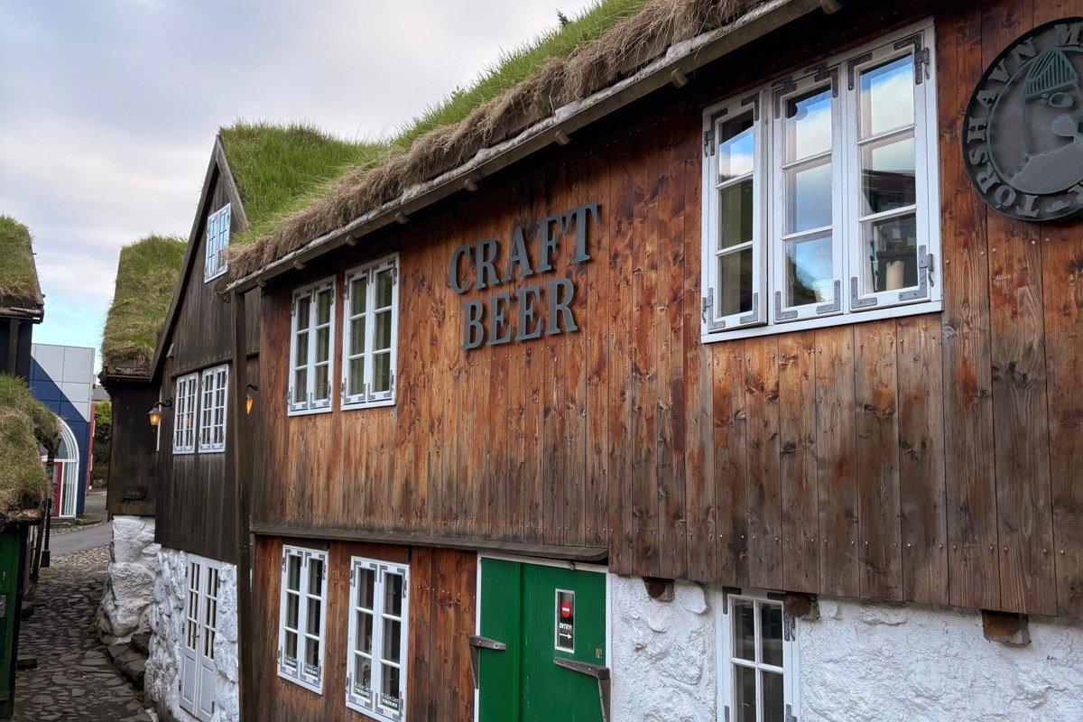 Gjogv Faroe Islands natural harbour gorge village turf roofs