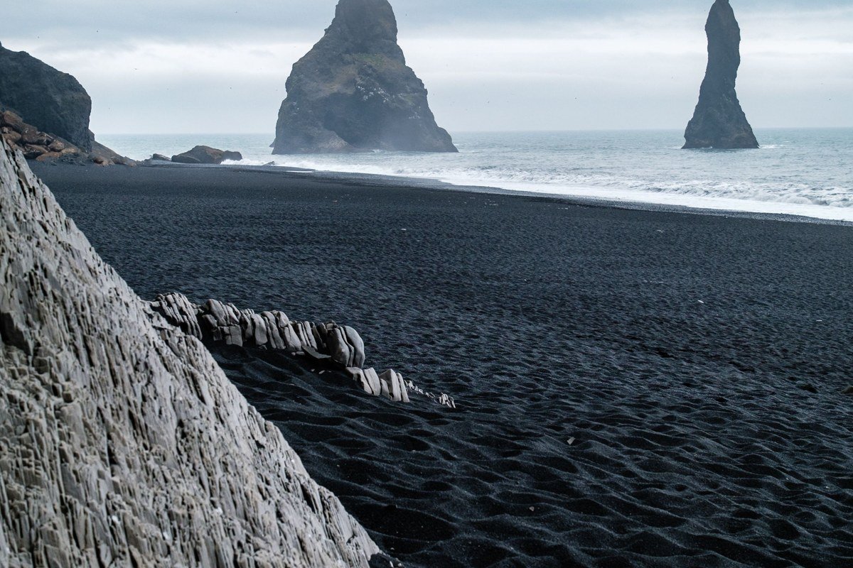 Tjornuvik Faroe Islands black sand beach sea stacks fog waves