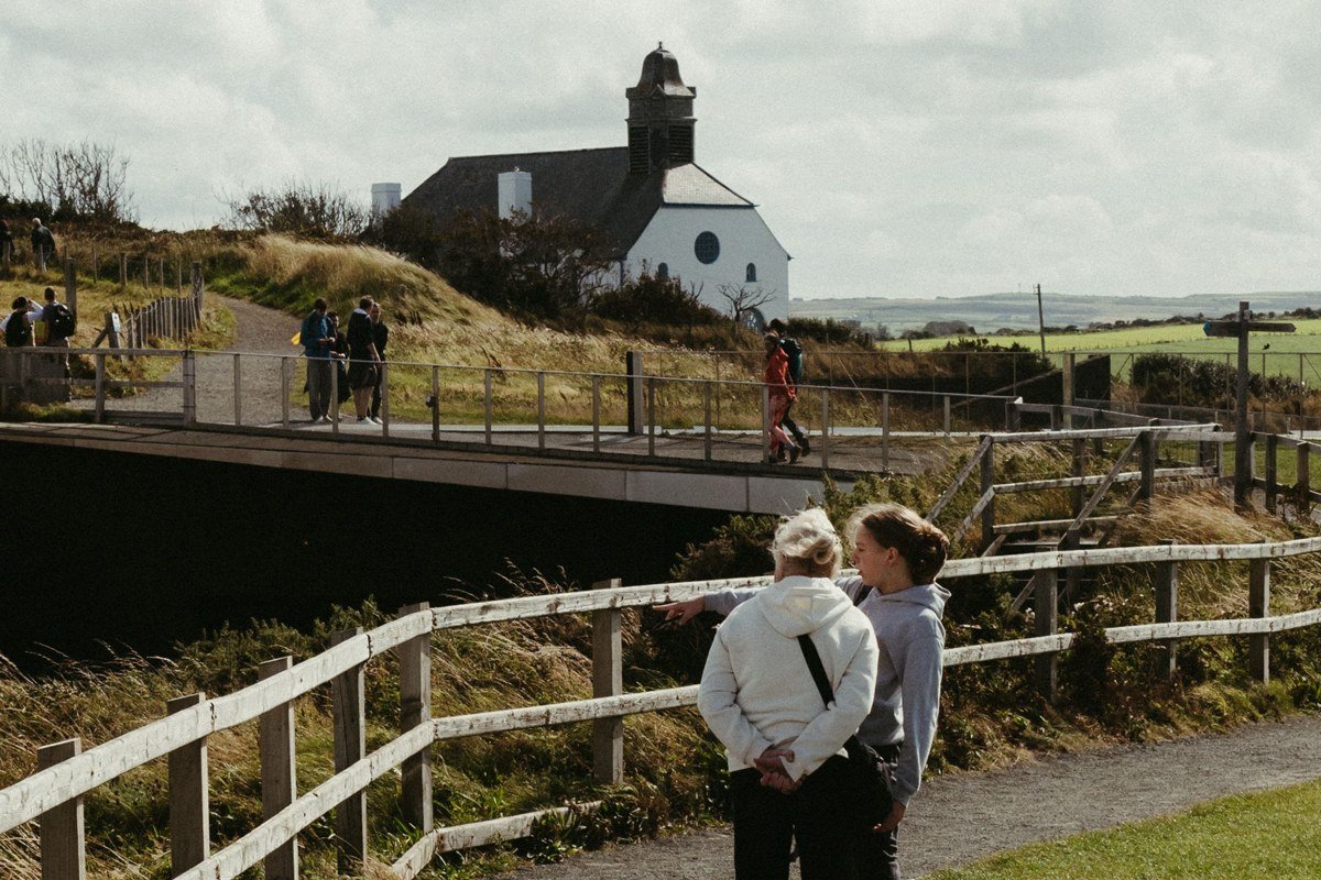 St Monans Fife East Neuk white church sea cliff fishing harbour village
