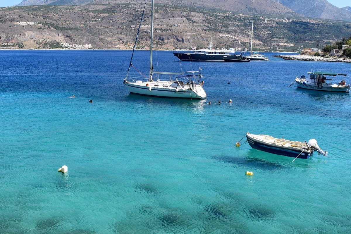 Loutro Crete white village horseshoe bay turquoise water no road access