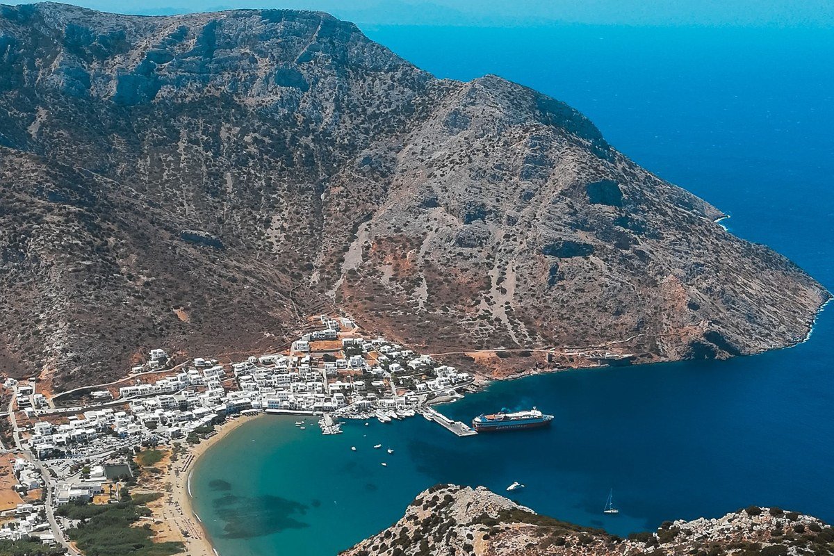 Folegandros Greece Chora hilltop village white cubic houses dramatic cliff sunset
