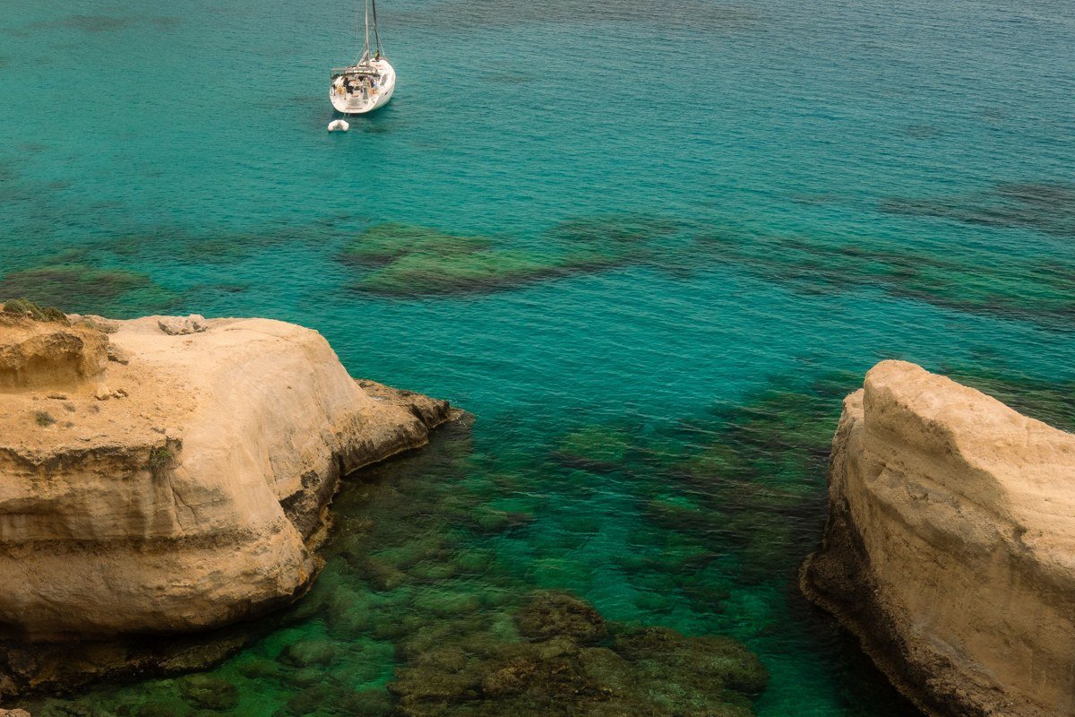 Donousa small Greek island isolated beach turquoise water rocky hills