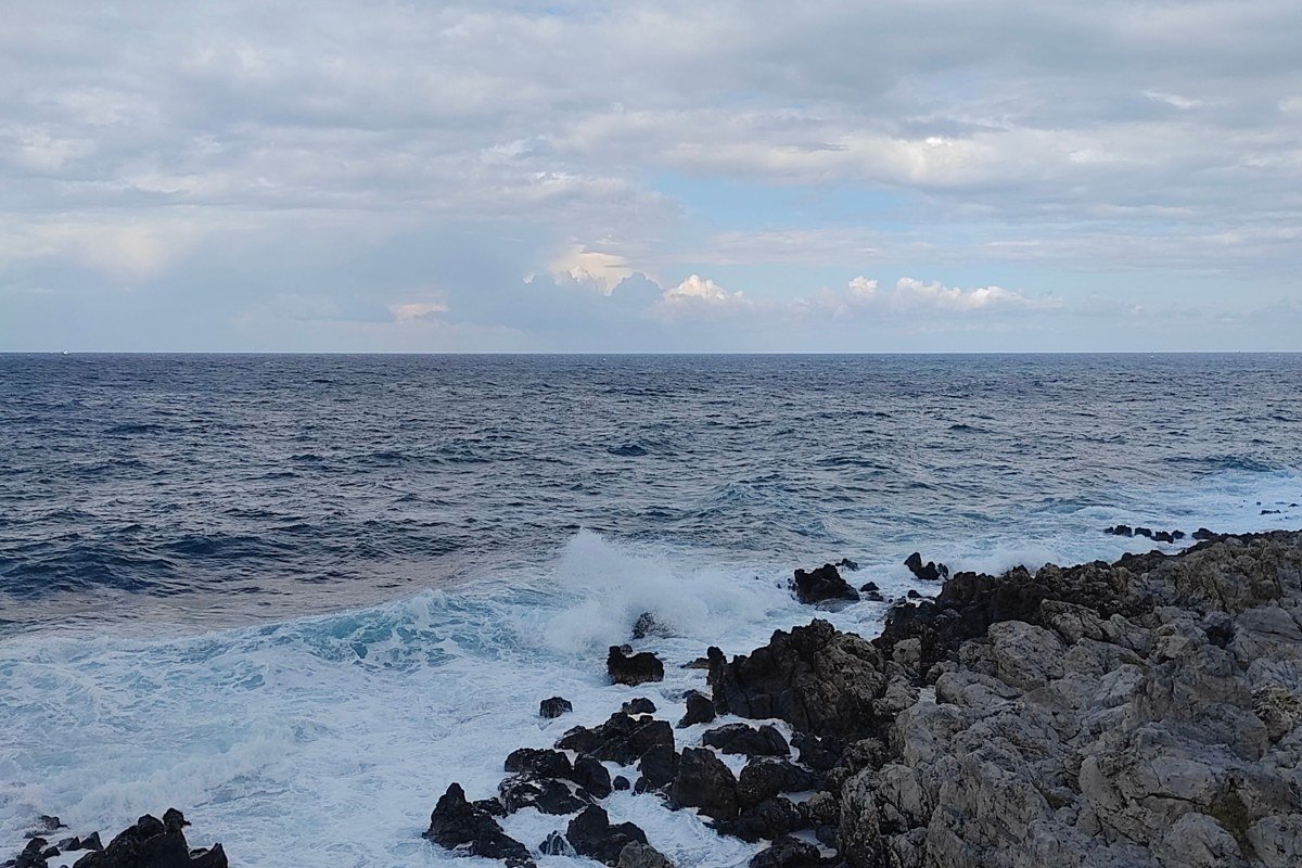 Ikaria Greece wild rocky coastline terraced village pine forest sea view