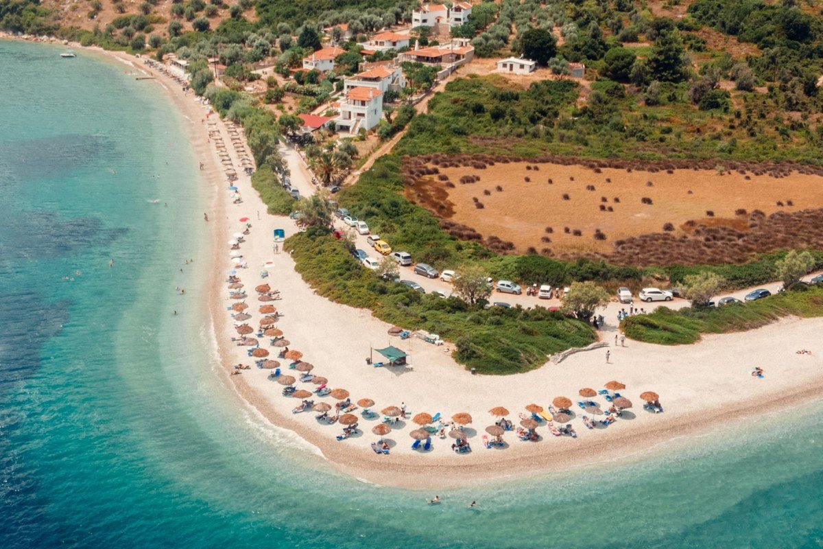 hidden Greek islands aerial view turquoise water whitewashed villages cliffside