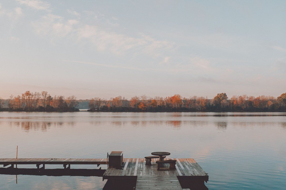 working fishing dock at sunrise on Lake Guntersville, Alabama, peeling boat ramp and still blue water