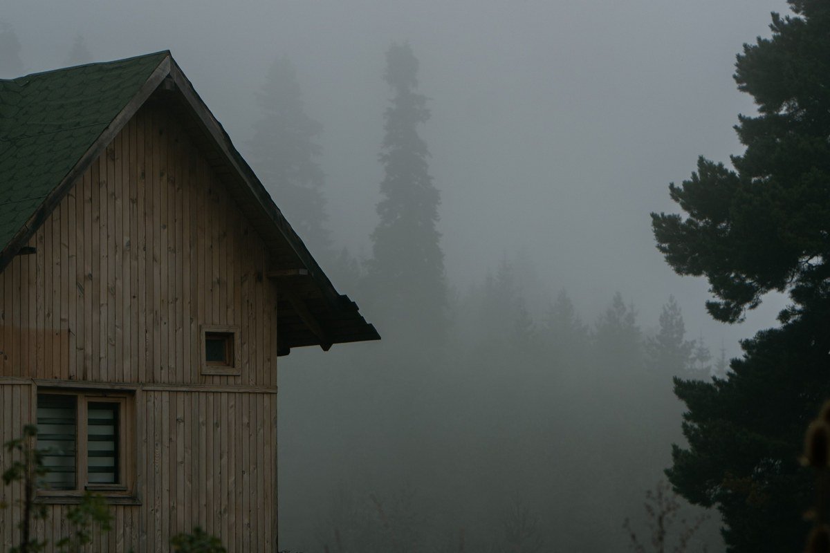 Moosehead Lake Maine Greenville waterfront timber cabins foggy morning