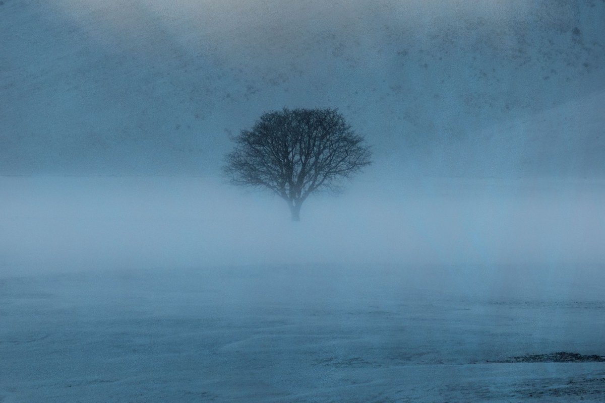 Glen Etive Scotland winter mist winding river through empty valley grey sky