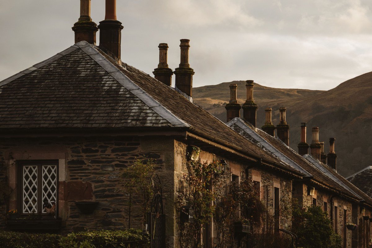 Lochcarron village Wester Ross Scotland loch shore cottages reflection evening light