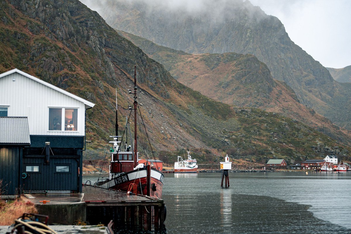 Puerto Eden Chile remote fishing village fjord channels fog wooden houses stilts