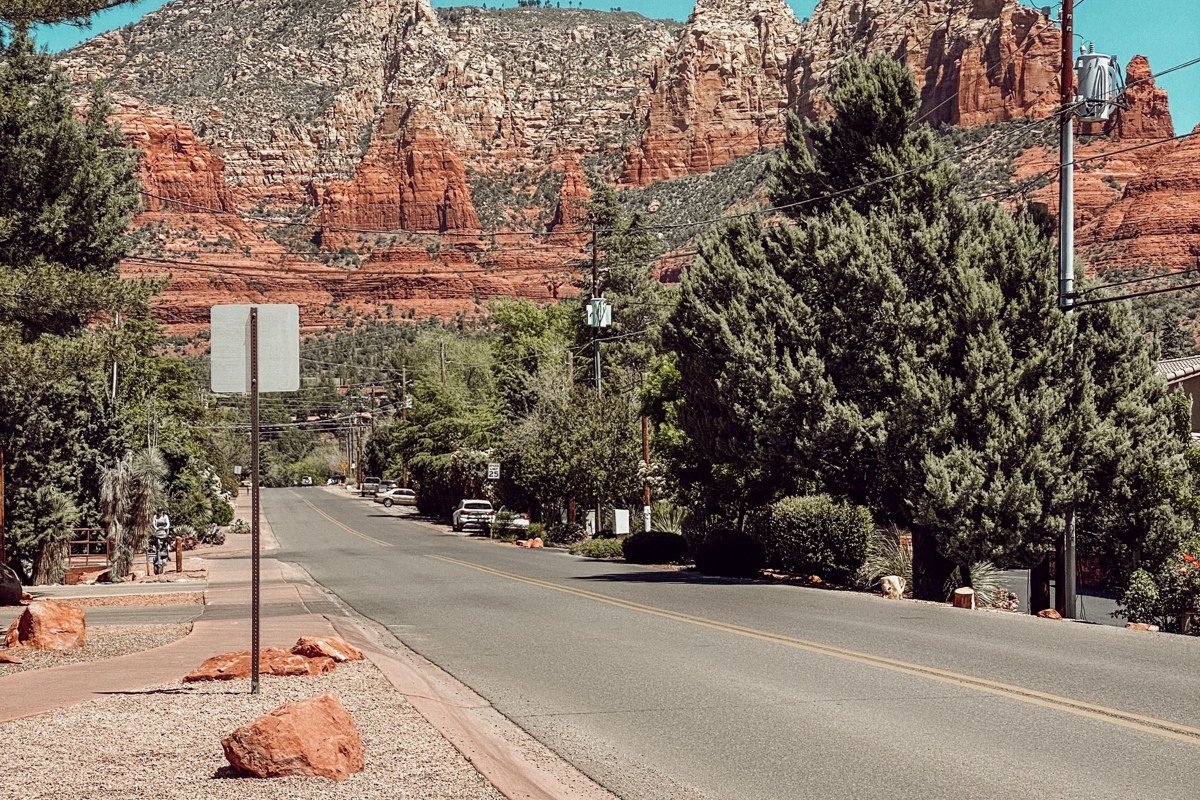 Airport Mesa Sedona sunset overlook with red rock buttes glowing orange