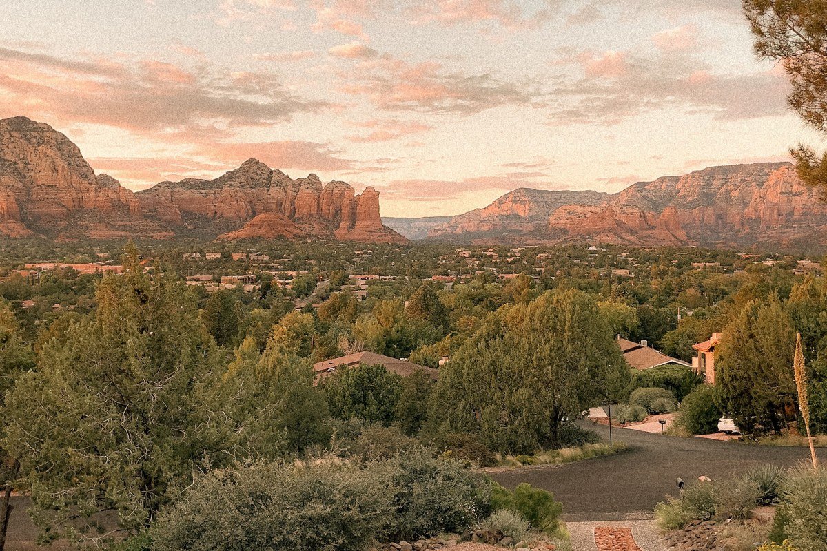 Chapel of the Holy Cross Sedona built into red rock cliff facing the setting sun