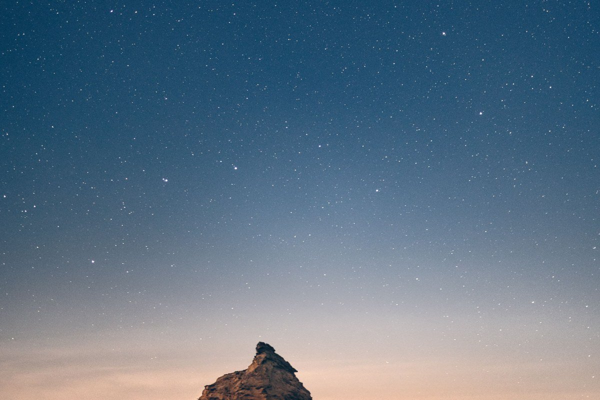 Alien Throne White Sands backcountry dune formation at dusk with stars appearing